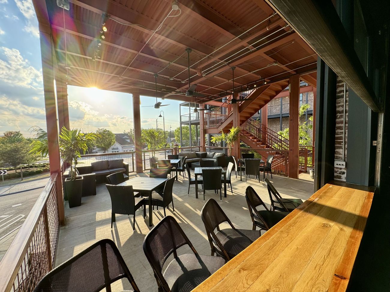 The covered balcony at Suite 200 at sunset overlooking Crabapple in Milton, Georgia